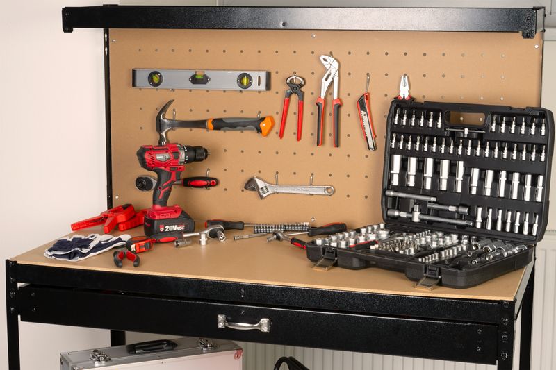 Masă de lucru atelier Racks DWB60, cu sertar, poliță și panou perforat, 120x60x150 cm, max. 230 kg