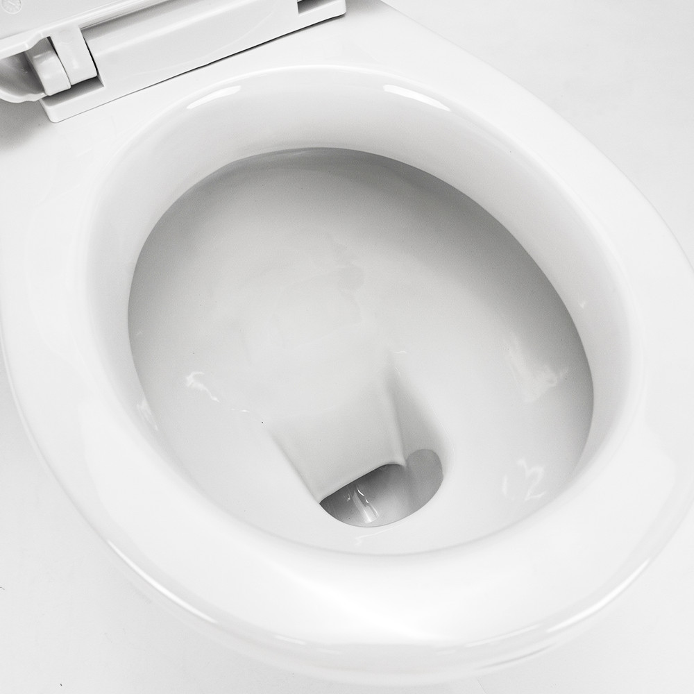 Toaletă monobloc Leziter Cleano cu evacuare inferioară, capac soft-close și rezervor 6 L