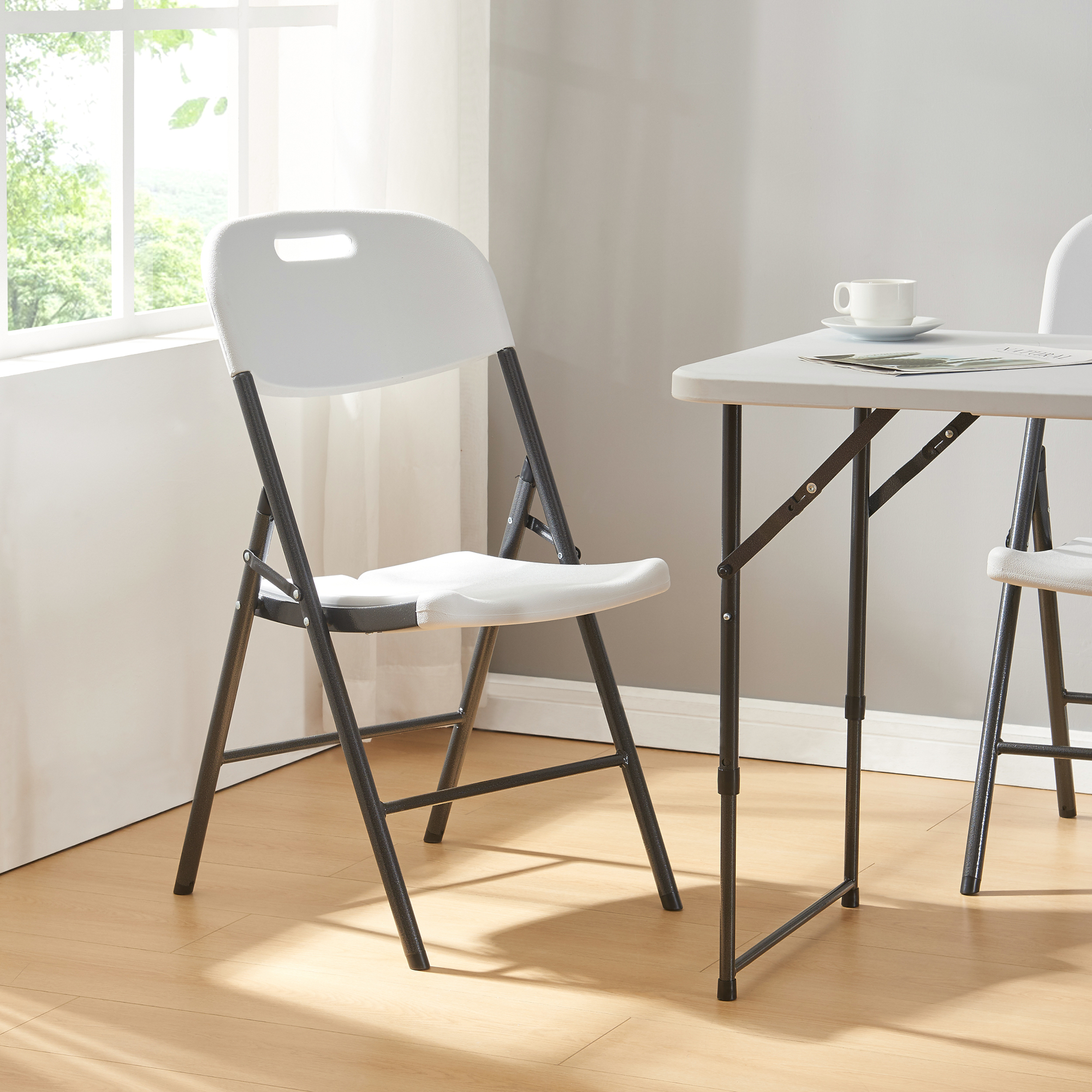 Set 4 scaune pliabile albe Ljusnarsberg din plastic HDPE si metal