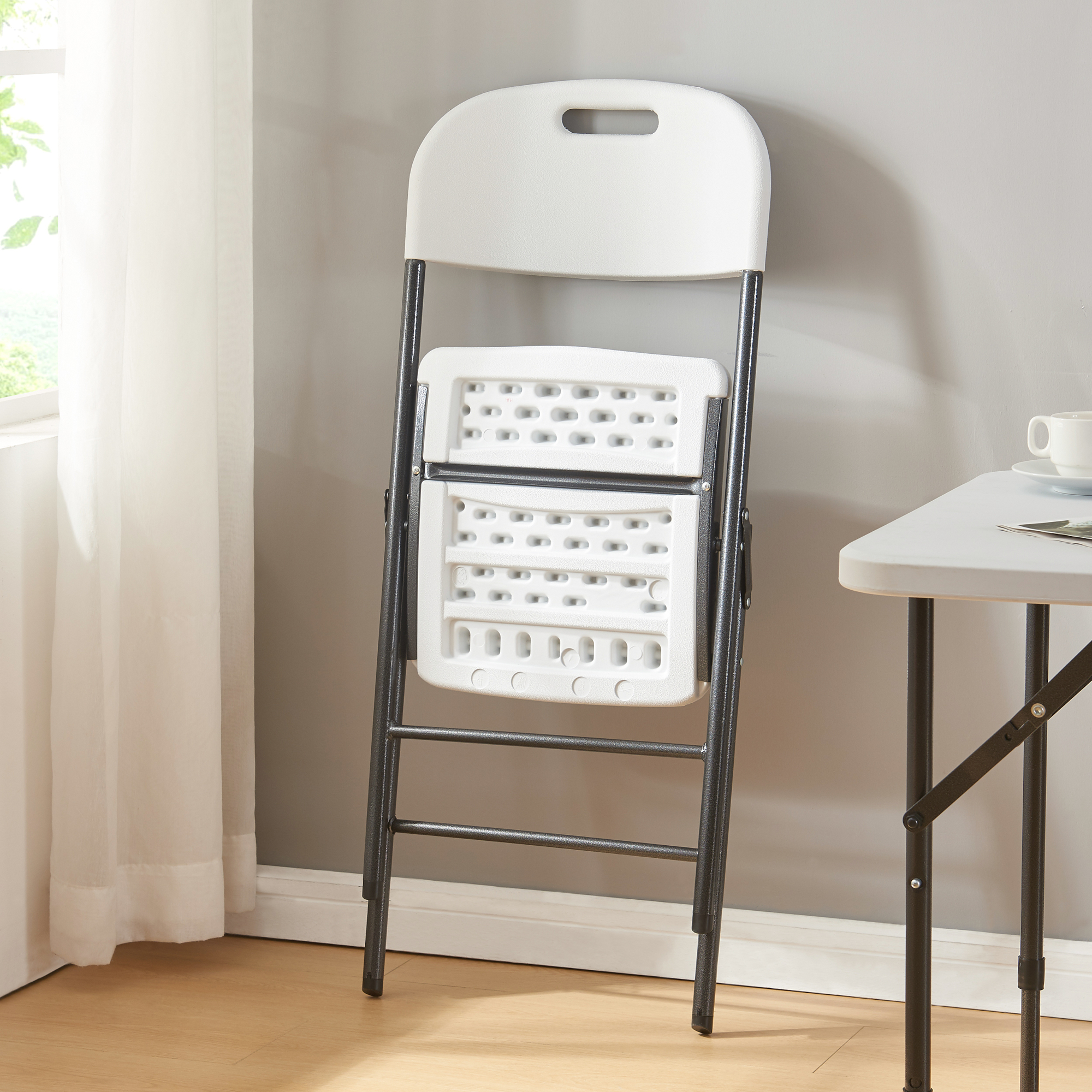 Set 4 scaune pliabile albe Ljusnarsberg din plastic HDPE si metal