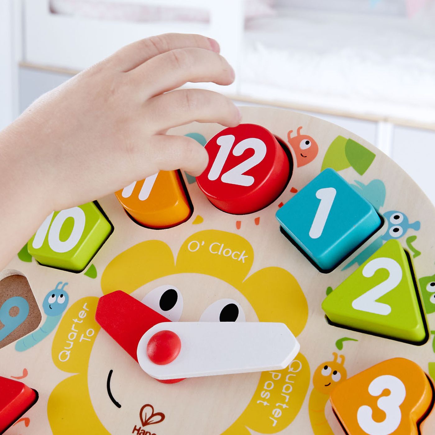 Ceas educativ din lemn Hape cu forme geometrice si cifre, 24,5 cm