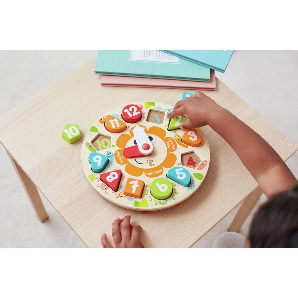 Ceas educativ din lemn Hape cu forme geometrice si cifre, 24,5 cm