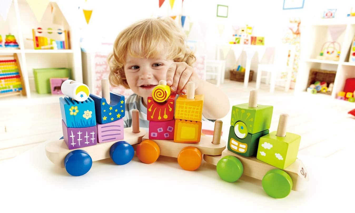 Tren din lemn Hape Fantasia cu blocuri colorate, 17 piese, 1+ ani