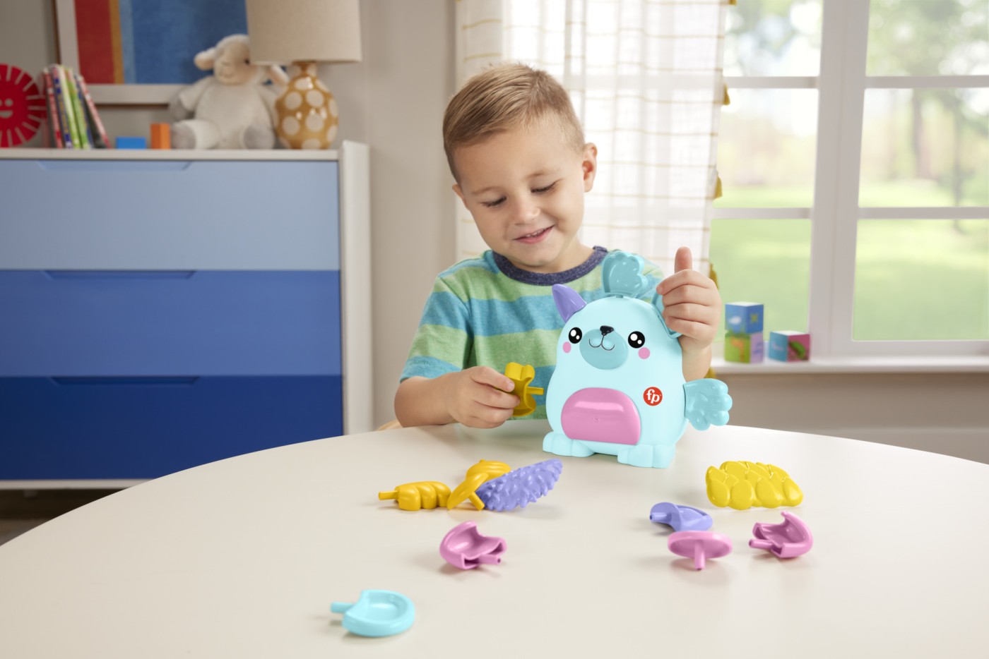 Jucarie Fisher-Price Animalute Mix & Match cu 17 piese