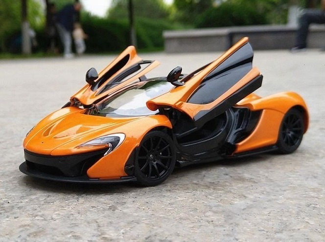 Macheta auto metalica McLaren P1 portocaliu scara 1:24 Rastar