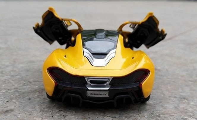 Macheta auto metalica McLaren P1 portocaliu scara 1:24 Rastar