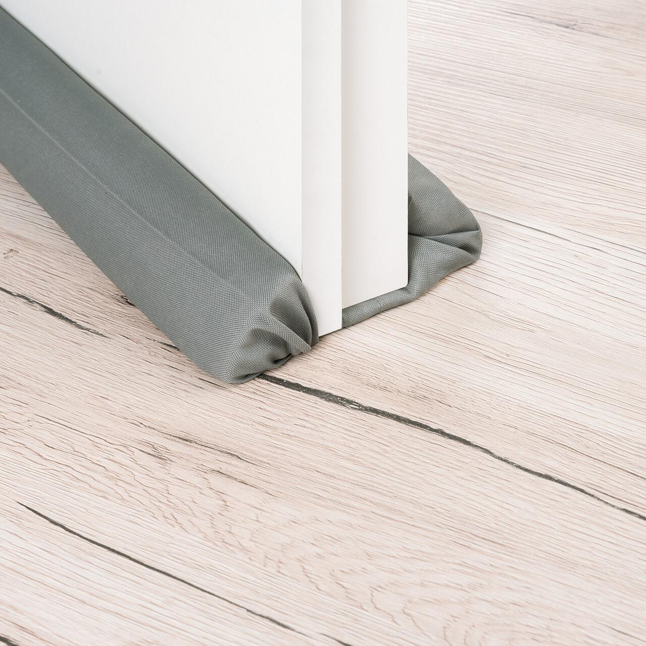 Protectie impotriva prinderii degetelor sub usa, opreste curentii de aer si izoleaza fonic, husa lavabila, 0-24 luni, gri, Reer 70121