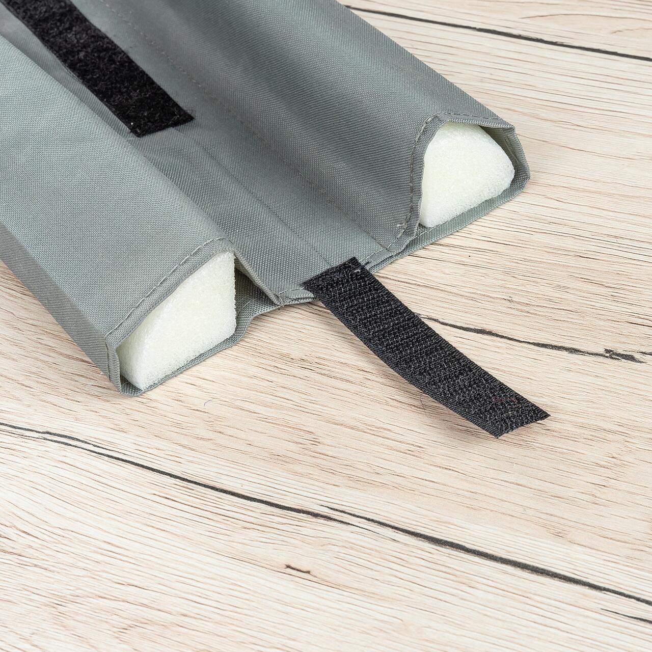 Protectie impotriva prinderii degetelor sub usa, opreste curentii de aer si izoleaza fonic, husa lavabila, 0-24 luni, gri, Reer 70121