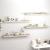 Rafturi perete suspendate, 4 buc., stejar, 120x23,5x3,8 cm, MDF GartenMobel Dekor