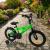 Bicicleta cu roti ajutatoare, 16 inch, v-brake, scaun ajustabil, cadru otel, jante aluminiu, aparatoare lant/noroi, verde MultiMark GlobalProd