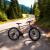 Bicicleta mtb 26 inch, schimbator shimano cu 21 viteze, suspensii fata, cadru otel, jante aluminiu, negru-portocaliu MultiMark GlobalProd