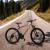 Bicicleta mtb 26 inch, schimbator shimano cu 21 viteze, suspensii fata, cadru otel, jante aluminiu, negru-portocaliu MultiMark GlobalProd