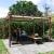 Pergola pentru gradina/terasa, retractabila, cadru aluminiu cu efect lemn, bej, 3.82x3x2.32 m GartenVIP DiyLine