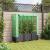 Strat înălțat cu husă de seră, aspect ratan, 120x40x138 cm GartenMobel Dekor
