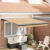 Cort retractabil automatic cu dungi multicolore 350x250 cm GartenMobel Dekor