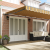 Marchiză retractabilă automată cu dungi multicolore 600x350 cm GartenMobel Dekor