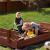 Lada nisip din lemn pliabila cu capac si bancute, 120x120x41 cm, maro Household NewTrend