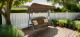 Leagan gradina 3 locuri 170x118x153 cm, cu perne, baldachin reglabil si masute laterale, structura otel, maro Household NewTrend