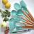 Set Sersimo 12 ustensile de bucatarie din silicon termorezistent si maner din bambus, verde Household NewTrend