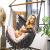 Hamac tip leagan suspendat pentru casa sau gradina HM45, gri inchis cu perne, 130x100cm, 150kg Household NewTrend