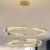 Lustra LED suspendata cu telecomanda si cristal PRISM REGAL 200W, 2 Cercuri, lumina Rece/Calda/Neutra, Dimabila, Auriu, Inaltime Reglabila ModernLight Concept