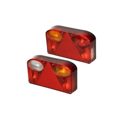 Set lampa spate 7 functii cu ceata si numar stanga dreapta 12V/24V 23cm Cod: ST0451-ST0452 Automotive TrustedCars