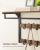VASAGLE Raft de perete tip cuier, 10 carlige detasabile, sina pentru haine, 30x65x42cm, maro rustic si negru Household NewTrend