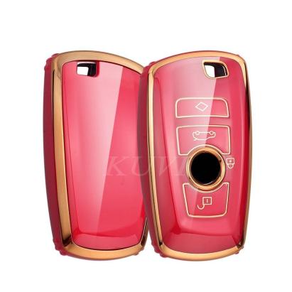 Husă cheie smartkey BMW Seria F, 3/4 butoane, TPU+PC roșu cu contur gold