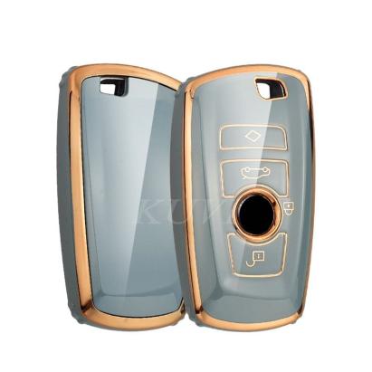 Husă protecție cheie BMW Smartkey 3/4 butoane, TPU+PC, gri-albăstrui cu contur gold