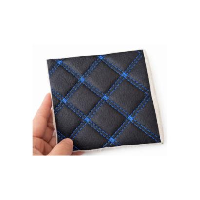 Material imitație piele matlasată romb negru, cusătură albastră – tapițerie auto și casă