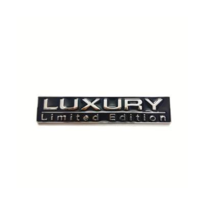 Ornament metalic auto Luxury crom cu negru 7.5x1.5 cm Cod: JST-01