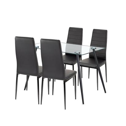 Set dining Leziter Cruz 4+1 negru, masă din sticlă securizată și 4 scaune