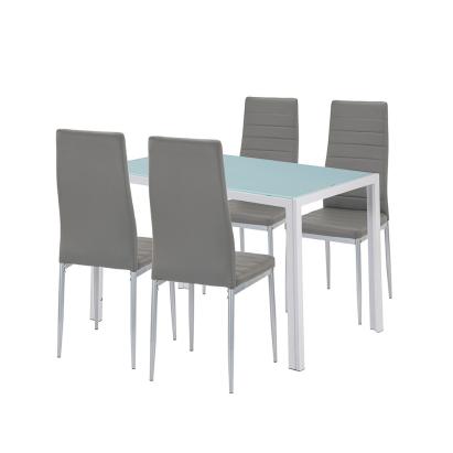 Set de dining Leziter Midland 4+1 cu masă din sticlă și 4 scaune gri