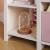 Bibliotecă pentru copii cu băncuță și cutii depozitare, alb/roz, 112 cm