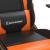 Scaun gaming masaj/suport picioare, negru/portocaliu, piele eco GartenMobel Dekor