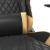 Scaun de gaming cu masaj/suport picioare negru/auriu piele eco GartenMobel Dekor