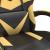 Scaun de gaming pivotant/suport picioare negru/auriu piele eco GartenMobel Dekor
