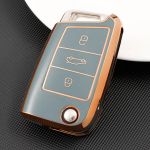 Husă cheie briceag TPU albastru cu contur auriu, 3 butoane, compatibilă Golf MK7/Octavia/Superb