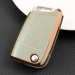 Husă pentru cheie briceag 3 butoane, TPU verde cu contur auriu, compatibilă Golf MK7