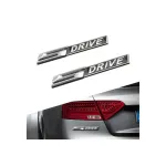 Ornament metalic auto S Drive crom cu insertii negre, 9,7 cm, autoadeziv