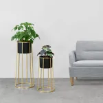 Set 2 suporturi pentru ghivece Macon din metal, negru-auriu