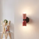 Aplica de perete Trorlos din metal, roz/rosu, 22x12x12 cm