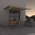 Copertină retractabilă manual cu LED, galben/alb, 300 x 250 cm GartenMobel Dekor